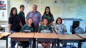 Dennis DiNoia works with students and teachers on test-taking skills at the Kamaile Academy in Hawaii.