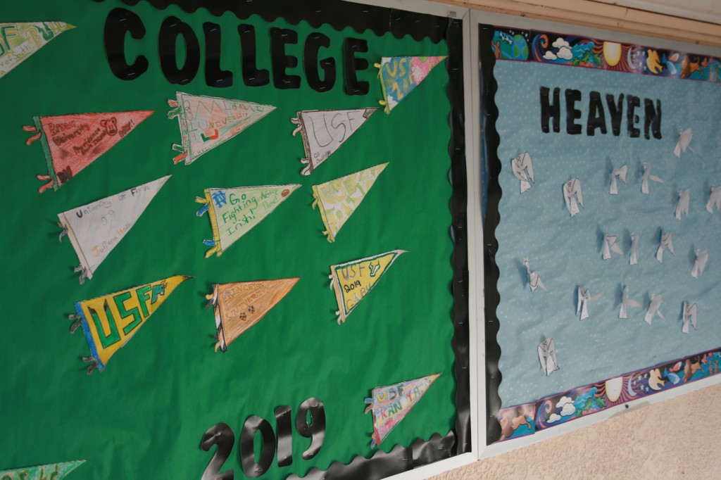 At St. Joseph's Catholic School in Tampa, a bulletin board displays the ACE Academies' motto.